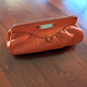 Cole Haan women's clutch, magnetic closure
